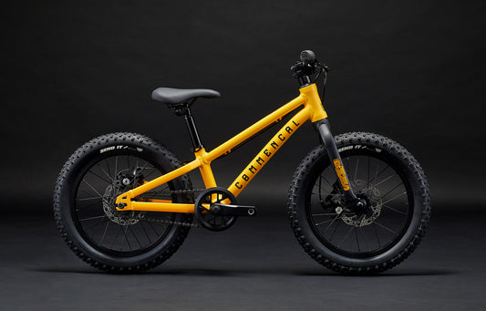 Bicicleta copii COMMENCAL Ramones 16″ OHLINS YELLOW galben fundal negru